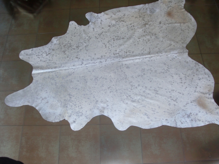 White silver grey cow hide carpet